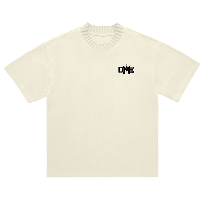Beige sweater with a black logo on a white background